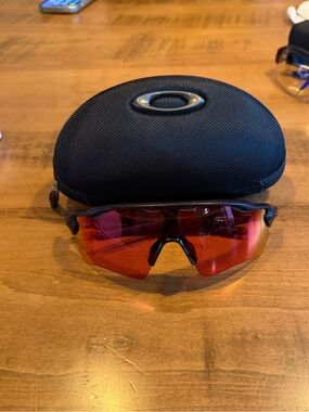 Oakley Sport Sunglasses with Red Mirror Lens and Black Frame